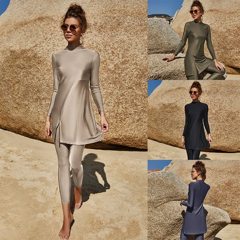 Women's Swimwear Long Sleeve Tunic Solid Color Swimsuit Full Length Leggings High Neck Swimming Suit Side Slit Two Piece Set
Women's Swimwear Long Sleeve Tunic Solid Color Swimsuit Full Length Leggings High Neck Swimming Suit Side Slit Two Piece Set