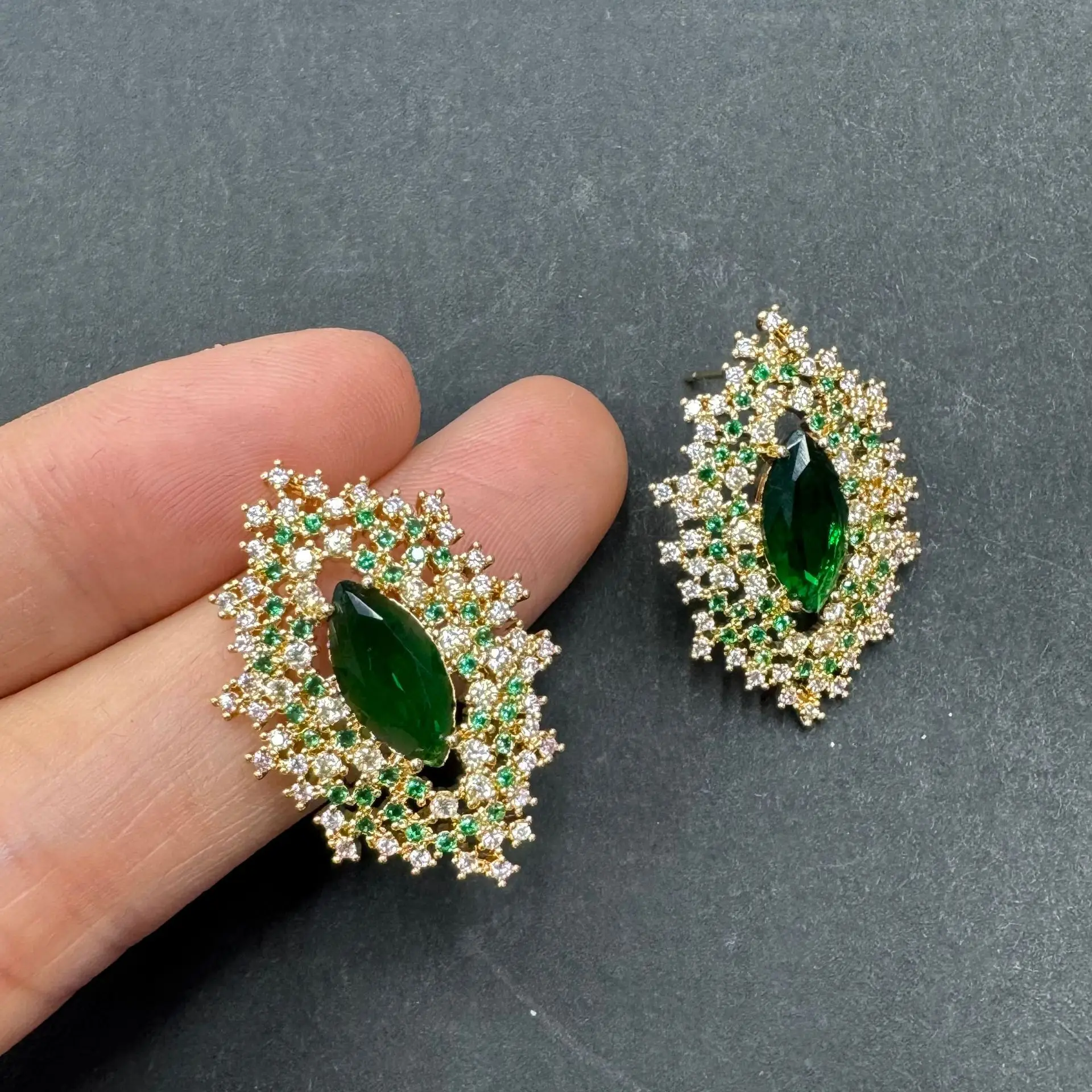 green zircon stud earrings for women elegant jewelry white blue zircon oval shape cut out earrings
green zircon stud earrings for women elegant jewelry white blue zircon oval shape cut out earrings