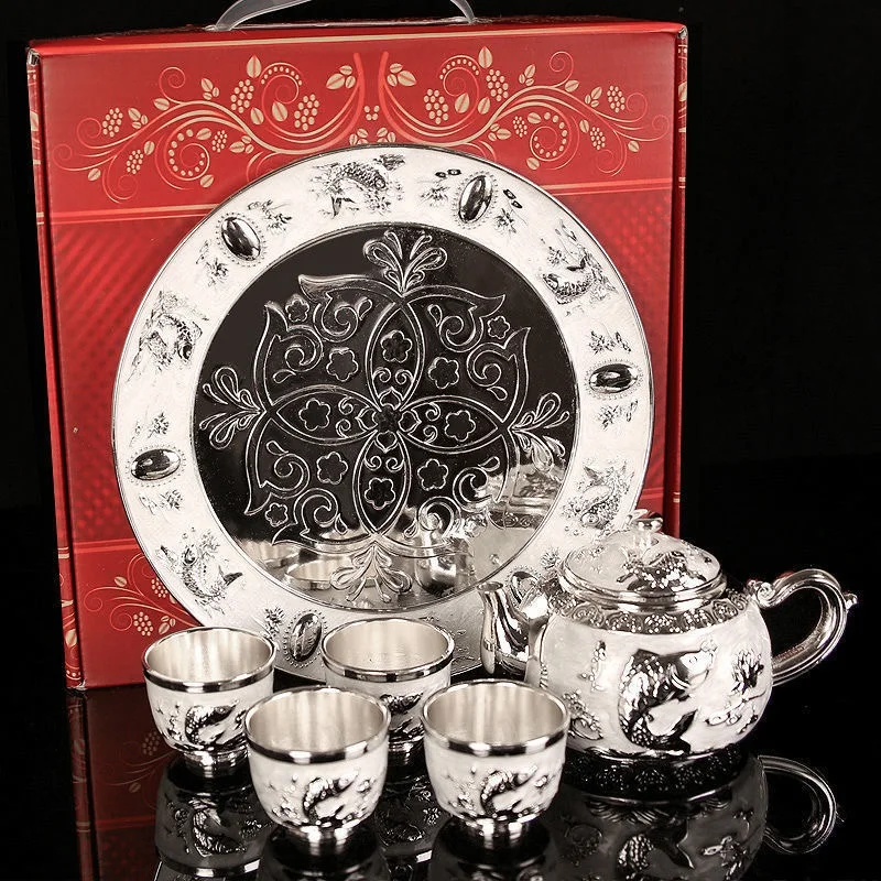Sterling silver tea set 999 sterling silver tea set full silver wine set 1 plate 1 Pot 4 cups kung fu tea set Chinese style
Sterling silver tea set 999 sterling silver tea set full silver wine set 1 plate 1 Pot 4 cups kung fu tea set Chinese style