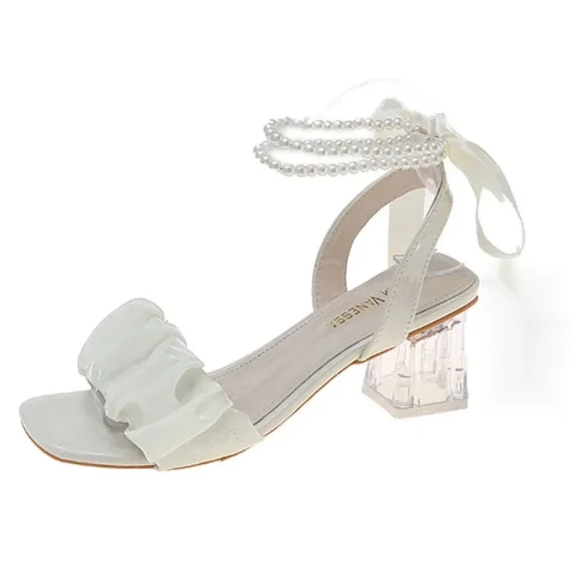 2024 Comfortable Women's Sandals Pearl High Heels Sandals Beige Thick Sole Sandals With Light Black summer new
2024 Comfortable Women's Sandals Pearl High Heels Sandals Beige Thick Sole Sandals With Light Black summer new