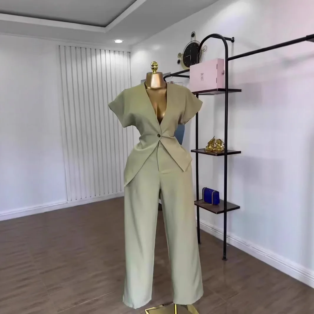 Summer European and American new style solid color short-sleeve suit with single button top and straight-leg pants set
Summer European and American new style solid color short-sleeve suit with single button top and straight-leg pants set