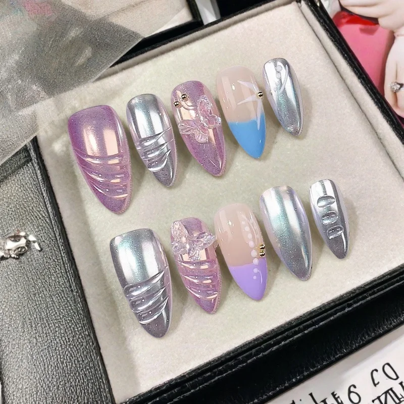 10Pcs Edgy Glam Press-On Handmade Nails Purple&Silver Almond Nails with 3D Wave Texture and Butterfly Accent for Women Wear Art
10Pcs Edgy Glam Press-On Handmade Nails Purple&Silver Almond Nails with 3D Wave Texture and Butterfly Accent for Women Wear Art