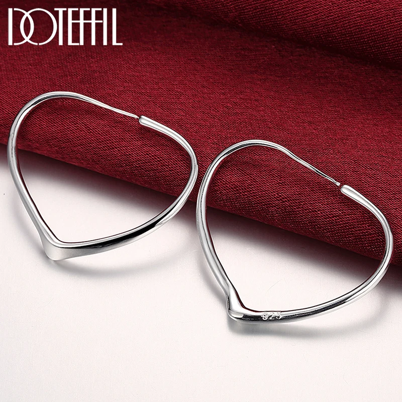 DOTEFFIL 925 Sterling Silver Smooth Heart Hoop Earring For Woman Wedding Engagement Party Fashion Charm Jewelry
DOTEFFIL 925 Sterling Silver Smooth Heart Hoop Earring For Woman Wedding Engagement Party Fashion Charm Jewelry