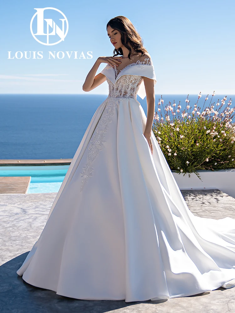 LOUIS NOVIAS Атласное свадебное платье Фея Невидимый вырез с короткими рукавами и аппликациями Простое бальное платье Свадебное платье Robe De Mariage
LOUIS NOVIAS Атласное свадебное платье Фея Невидимый вырез с короткими рукавами и аппликациями Простое бальное платье Свадебное платье Robe De Mariage