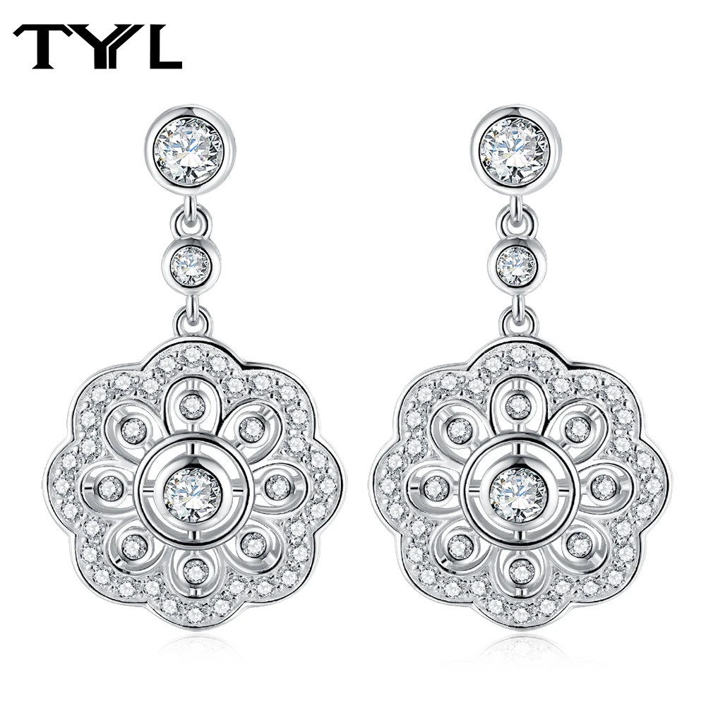 TYYL Moissanite Diamond Pendant Earrings for Women 925 Silver Hollow Flower Design Sparkling Drop Earrings Wedding Bride Jewelry
TYYL Moissanite Diamond Pendant Earrings for Women 925 Silver Hollow Flower Design Sparkling Drop Earrings Wedding Bride Jewelry