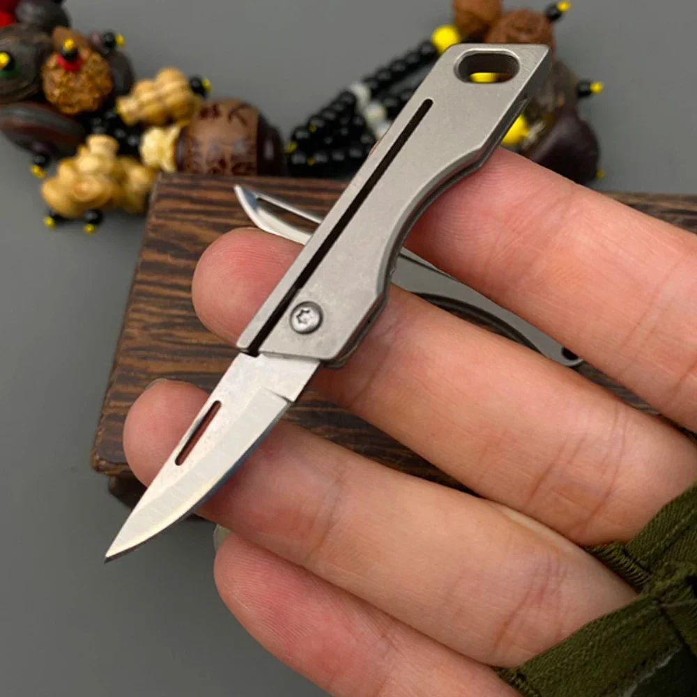 Titanium Alloy TC4 Folding Knife EDC Portable Keychain Pendant Knife Express Unpacking Pocket Knife Gift EDC Tool
Titanium Alloy TC4 Folding Knife EDC Portable Keychain Pendant Knife Express Unpacking Pocket Knife Gift EDC Tool