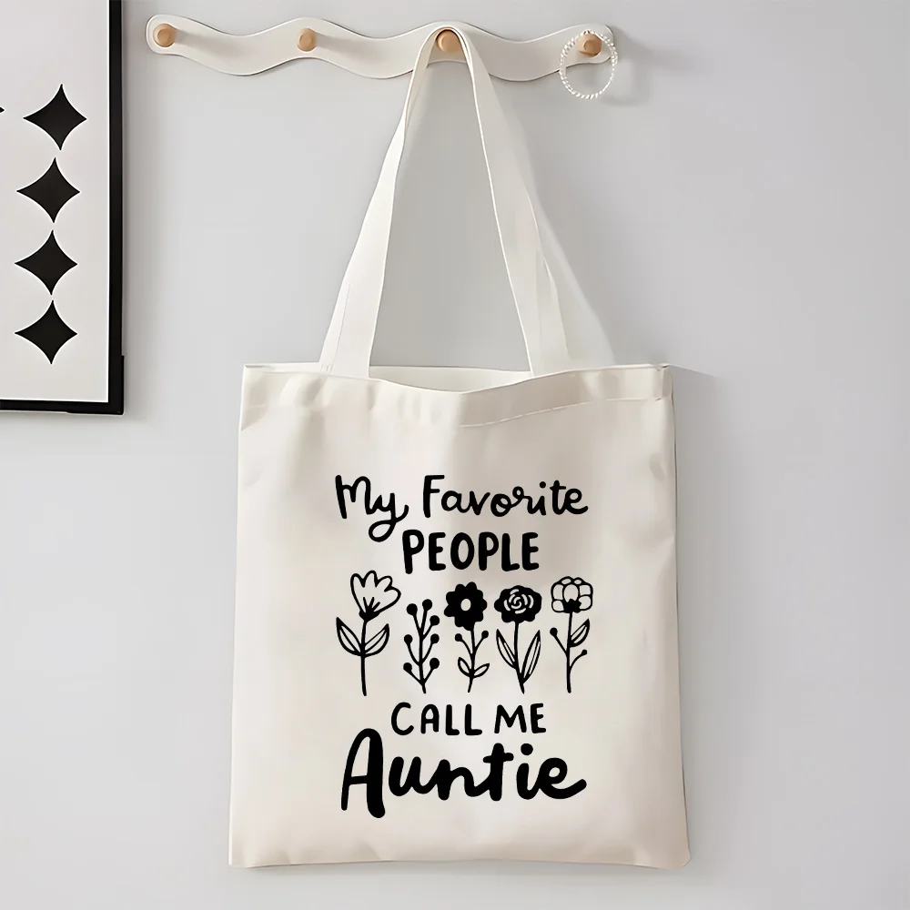 Large Canvas Tote Bag with a High Capacity That Says 'my Favorite People Call Me Auntie' Suitable for Grocery Shopping Travel
Large Canvas Tote Bag with a High Capacity That Says 'my Favorite People Call Me Auntie' Suitable for Grocery Shopping Travel