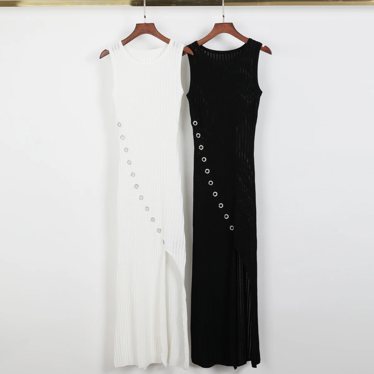 2663 High-quality Summer New Fashionable Slim Fit Knitted Perforated Diamond Inlaid Sleeveless Long Women Dress
2663 High-quality Summer New Fashionable Slim Fit Knitted Perforated Diamond Inlaid Sleeveless Long Women Dress