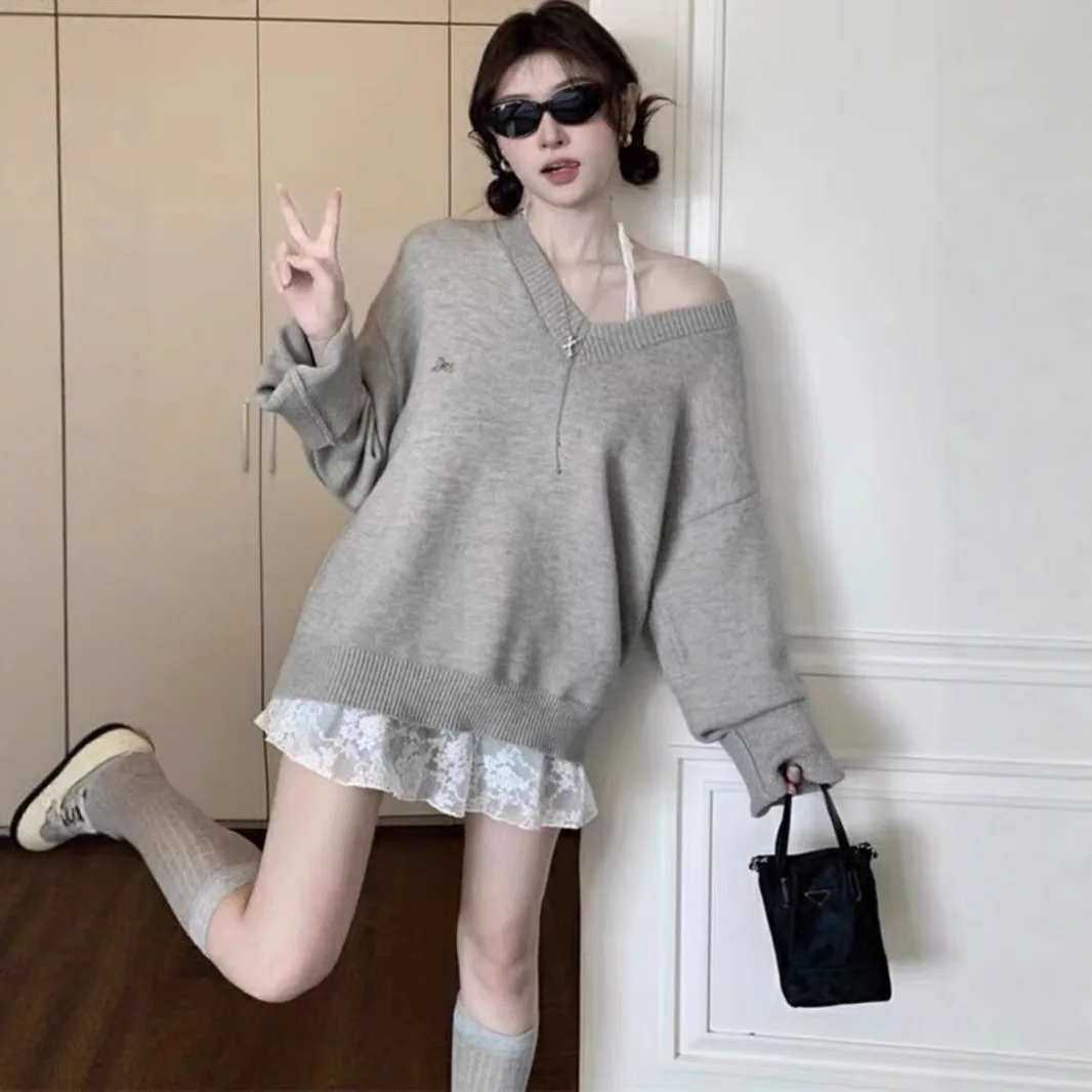 Autumn and winter new sheepskin Korean lazy style loose V-neck solid color knitted sweater chic women's pullover
Autumn and winter new sheepskin Korean lazy style loose V-neck solid color knitted sweater chic women's pullover