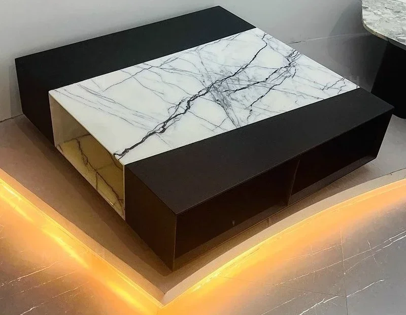 A Minimalist marble coffee table living room hollow geometric coffee table
A Minimalist marble coffee table living room hollow geometric coffee table