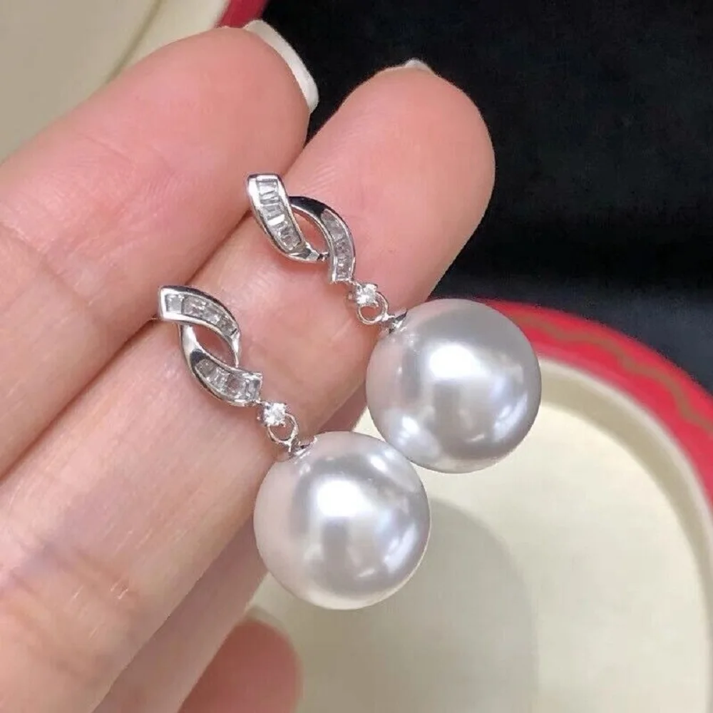 Женские серьги с жемчугом 10-11 мм, великолепные круглые белые серьги AAAA Akoya 925S, бесплатная доставка
Женские серьги с жемчугом 10-11 мм, великолепные круглые белые серьги AAAA Akoya 925S, бесплатная доставка
