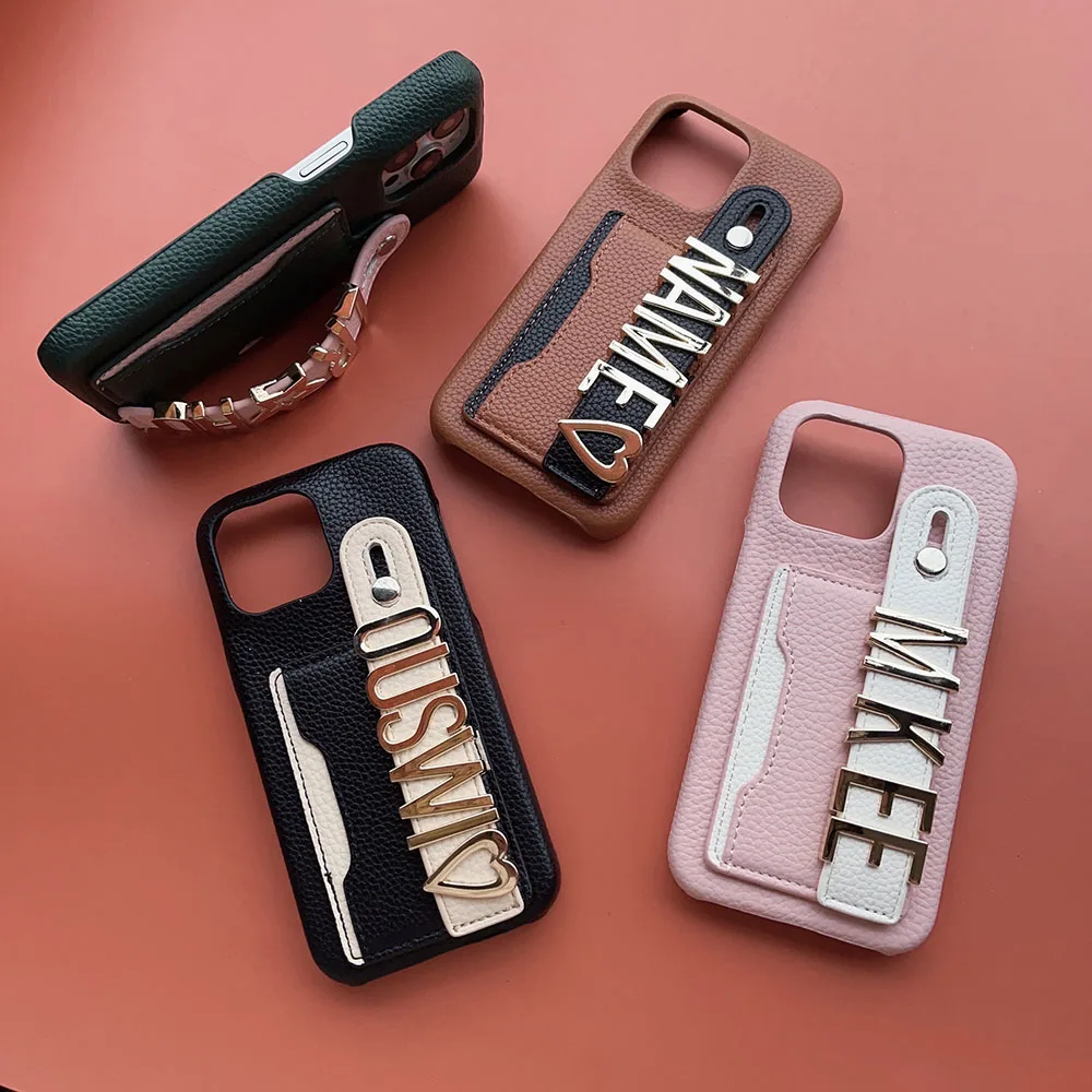 Holder Wristband Card Customized Gold Metal Letter Name Leather Case for iPhone 16pro max 15 14 13 Pro max 12 11 Mini Plus Cover
Holder Wristband Card Customized Gold Metal Letter Name Leather Case for iPhone 16pro max 15 14 13 Pro max 12 11 Mini Plus Cover