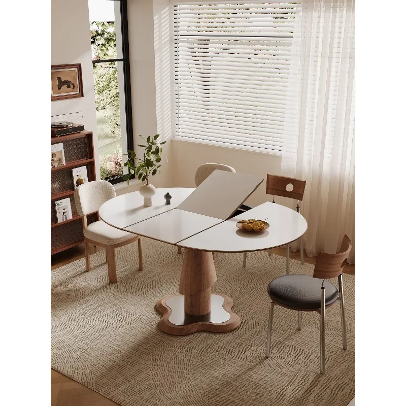 Small apartment folding solid wood dining table variable round table modern simple household living room
Small apartment folding solid wood dining table variable round table modern simple household living room