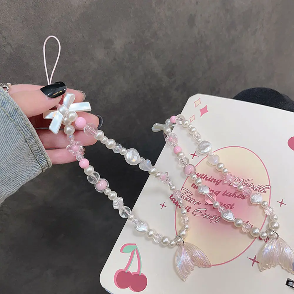 Mermaid bracelet short mobile phone lanyard creative wrist lanyard high-end handmade bead string pendant phone wrist
Mermaid bracelet short mobile phone lanyard creative wrist lanyard high-end handmade bead string pendant phone wrist