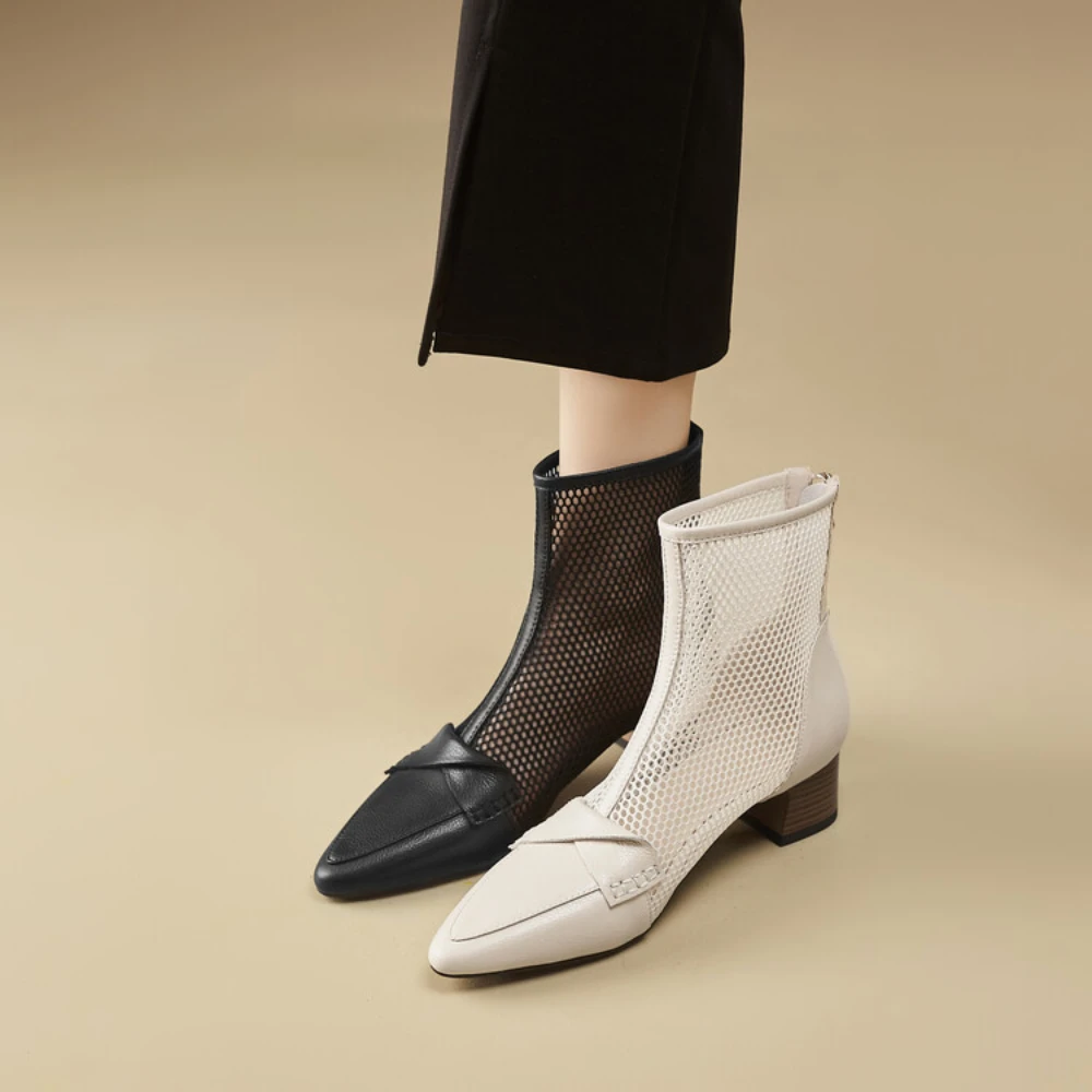 Spring and summer genuine leather mesh cool boots, women's high heels bare boots black and white hollow out women's short boots
Spring and summer genuine leather mesh cool boots, women's high heels bare boots black and white hollow out women's short boots