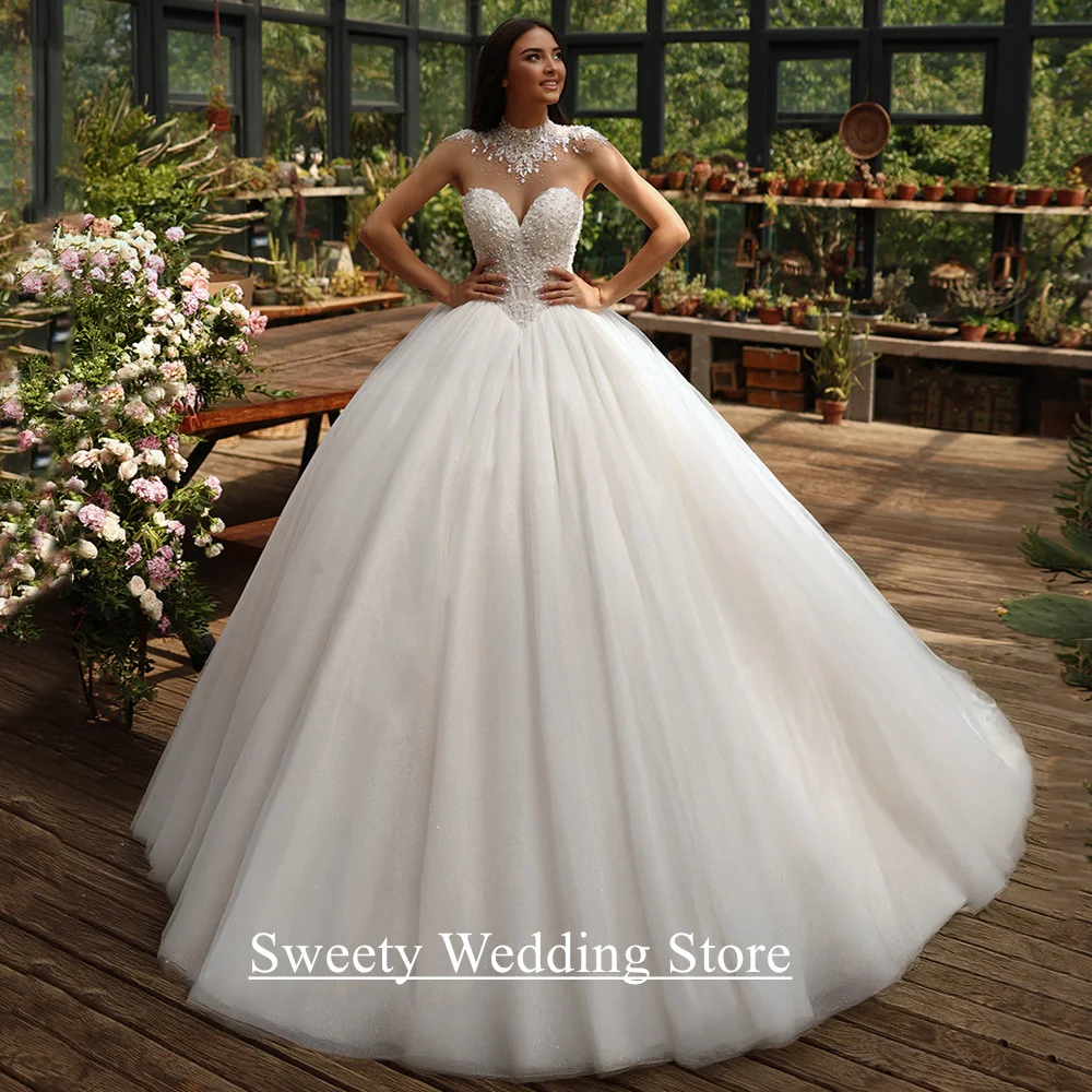 Charming Ball Gown Wedding Dresses New Customized High Neck Beading Stones Pearls Sweep Train Bride Dresses Vestido Noiva
Charming Ball Gown Wedding Dresses New Customized High Neck Beading Stones Pearls Sweep Train Bride Dresses Vestido Noiva