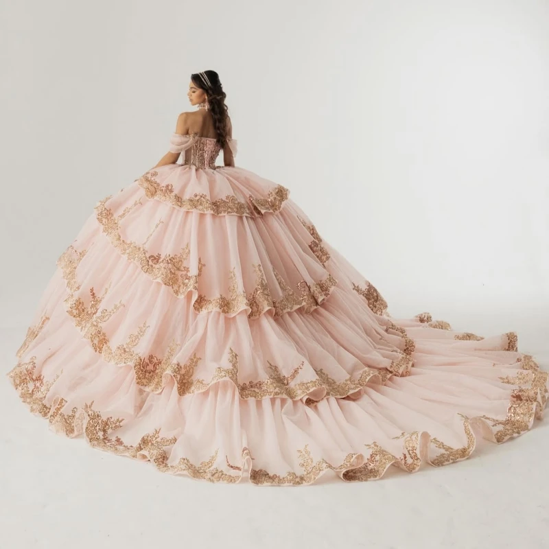 Light Pink Shiny Ball Gown Quinceanera Dresses Gold Applique Lace Beading Crystal Tiered Tull Corset Off The Shoulder Sweet 16
Light Pink Shiny Ball Gown Quinceanera Dresses Gold Applique Lace Beading Crystal Tiered Tull Corset Off The Shoulder Sweet 16