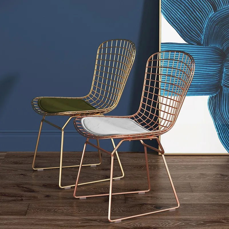 Internet celebrity hollow gold dining chair wrought iron creative home chair dressing
Internet celebrity hollow gold dining chair wrought iron creative home chair dressing