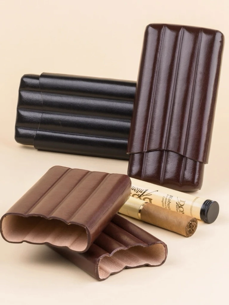 A Lightweight Leather Protective Cigar Box That Can Hold Up to 4 Cigars.
A Lightweight Leather Protective Cigar Box That Can Hold Up to 4 Cigars.