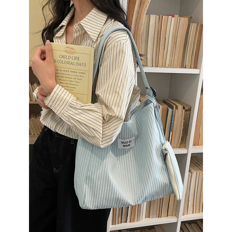 Striped tote bag for women2026Spring and summer new large-capacity commuter shoulder bag, simple and versatile canvas crossbody
Striped tote bag for women2026Spring and summer new large-capacity commuter shoulder bag, simple and versatile canvas crossbody