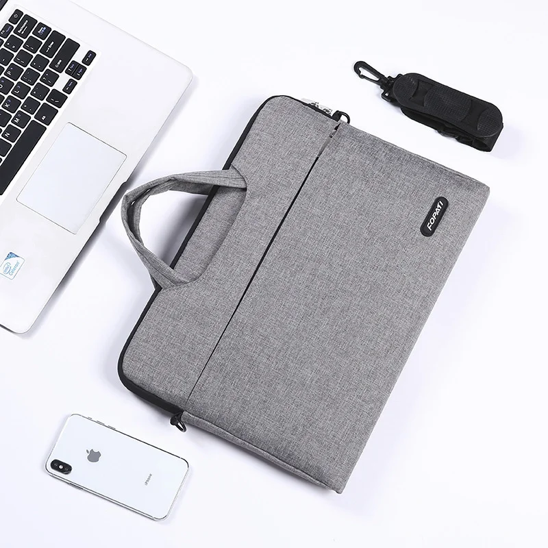 New thin and light laptop computer handbag 13 inch 14 Apple notebook liner Oxford cloth removable shoulder
New thin and light laptop computer handbag 13 inch 14 Apple notebook liner Oxford cloth removable shoulder