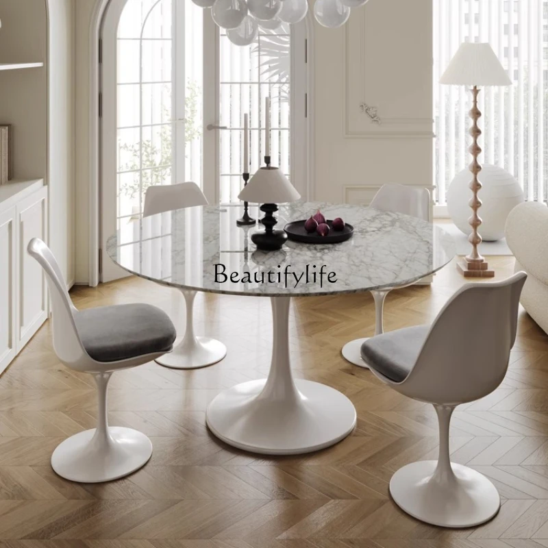 Light French retro natural marble dining table round household small apartment cream wind light luxury tulip round dining table
Light French retro natural marble dining table round household small apartment cream wind light luxury tulip round dining table
