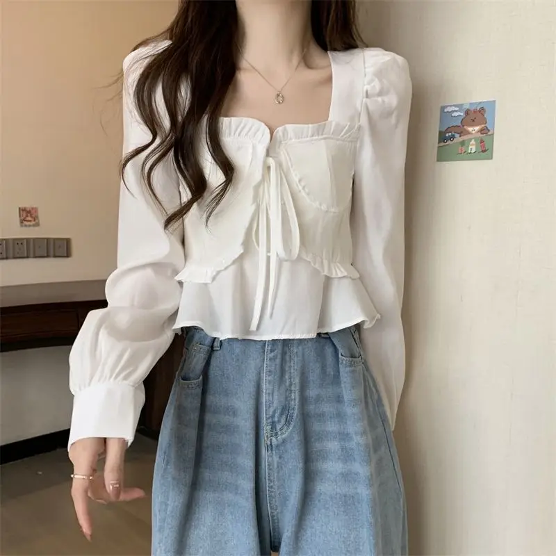 Korean Version Spliced Lace Up Square Neck Long Sleeved Shirt Women in Spring Autumn New Design Sense Short Top Chic Small Shirt
Korean Version Spliced Lace Up Square Neck Long Sleeved Shirt Women in Spring Autumn New Design Sense Short Top Chic Small Shirt