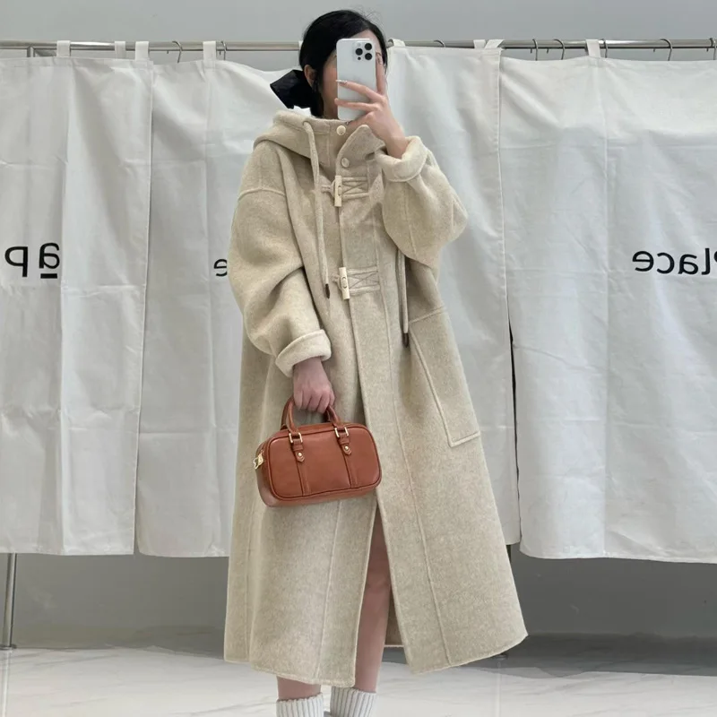 High-end double-sided cashmere coat women's long 2024 new Korean version straight hooded woolen coat
High-end double-sided cashmere coat women's long 2024 new Korean version straight hooded woolen coat