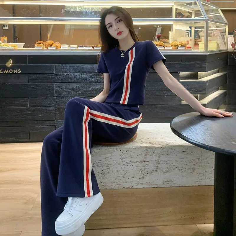 Fashion Slimming Set Summer Round Neck Short Sleeved Top+casual Sports Pants Two-piece Set
Fashion Slimming Set Summer Round Neck Short Sleeved Top+casual Sports Pants Two-piece Set