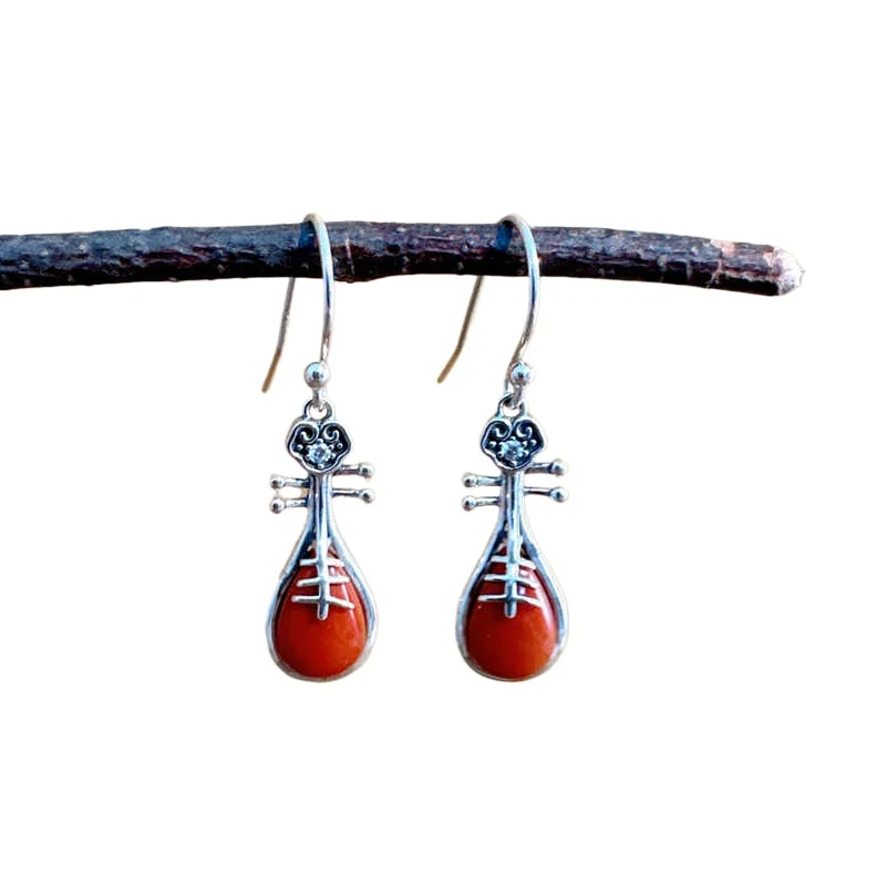 Nanhong agate pipa earrings 925 silver inlaid retro style women's fashion versatile simple temperament earrings
Nanhong agate pipa earrings 925 silver inlaid retro style women's fashion versatile simple temperament earrings