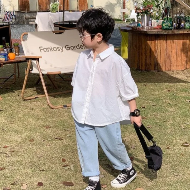 Новая летняя повседневная рубашка для мальчиков в корейском стиле 2026 года, модный топ для малышей
Новая летняя повседневная рубашка для мальчиков в корейском стиле 2026 года, модный топ для малышей