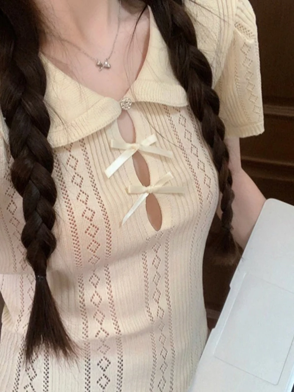 Sweet Spicy Girl Doll Collar Knitted ort Sve T-irt Women Summer Design Knot Hollow out Unique ort Top
Sweet Spicy Girl Doll Collar Knitted ort Sve T-irt Women Summer Design Knot Hollow out Unique ort Top