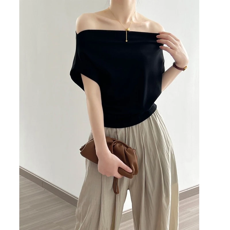 Летние новые однотонные свободные сексуальные топы с коротким рукавом, модные повседневные женские футболки, стильные топы с открытыми плечами и плиссировкой
Летние новые однотонные свободные сексуальные топы с коротким рукавом, модные повседневные женские футболки, стильные топы с открытыми плечами и плиссировкой