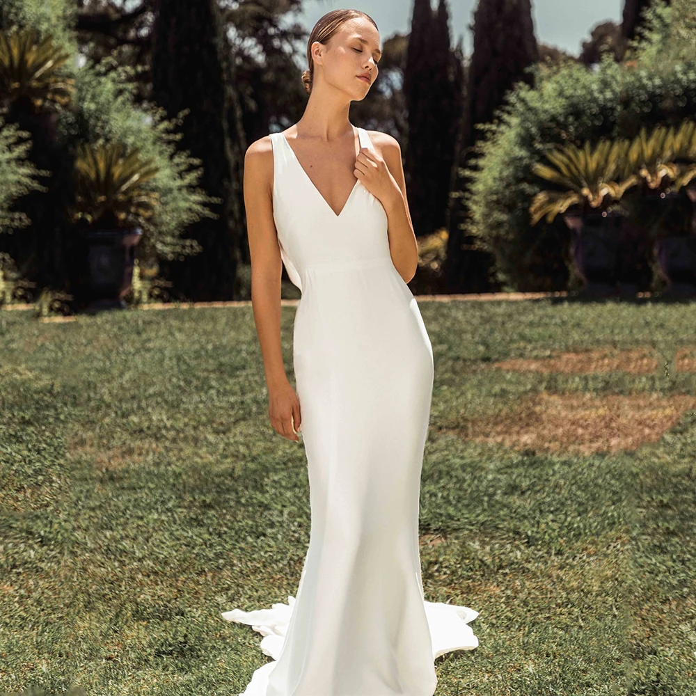Customized Beach Wedding Dresses for Women 2026 Bride V Neck Mermaid Wedding Gowns Long Sleeveless Ivory Satin Bridal Dresses
Customized Beach Wedding Dresses for Women 2026 Bride V Neck Mermaid Wedding Gowns Long Sleeveless Ivory Satin Bridal Dresses
