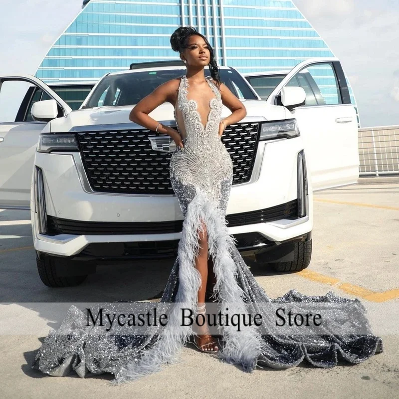 Customized Silver Sequins Mermaid Diamond Prom Dress Black Girls Crystal Beaded High Slit Feather Evening Party Gown
Customized Silver Sequins Mermaid Diamond Prom Dress Black Girls Crystal Beaded High Slit Feather Evening Party Gown