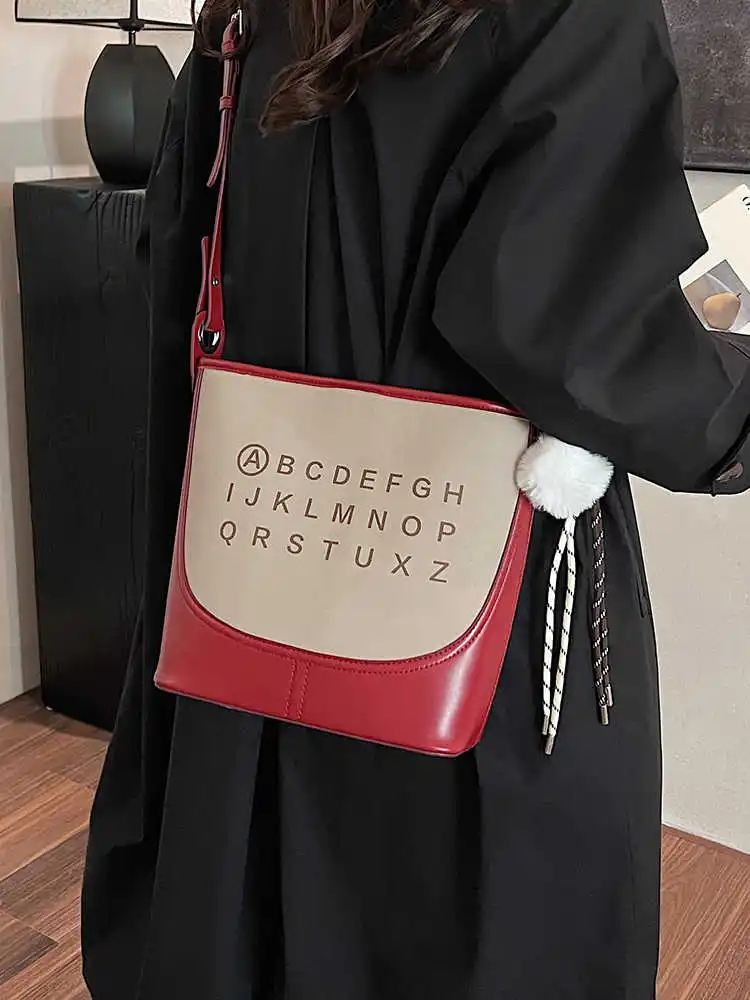Fashion Color Contrasting Letter Bucket Bag For Women New Trendy Versatile One Shoulder Bag High End Casual Splicing Style Bag
Fashion Color Contrasting Letter Bucket Bag For Women New Trendy Versatile One Shoulder Bag High End Casual Splicing Style Bag