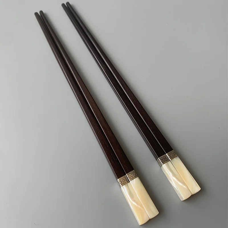 Black sour branch abalone shell chopsticks Southeast Asia big red sour branch wood chopsticks inlaid with mother-of-pearl mahoga
Black sour branch abalone shell chopsticks Southeast Asia big red sour branch wood chopsticks inlaid with mother-of-pearl mahoga