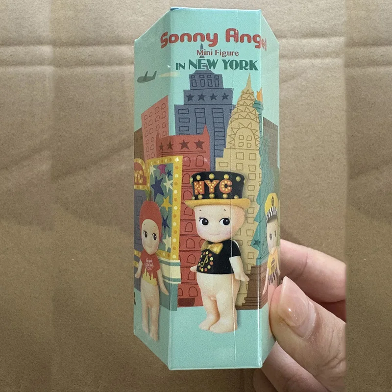 Оригинальная мини-фигурка Sonny Angel Blind Box, серия Нью-Йорк, коробка-сюрприз, ограниченная коллекция, украшения для кукол, подарки на день рождения
Оригинальная мини-фигурка Sonny Angel Blind Box, серия Нью-Йорк, коробка-сюрприз, ограниченная коллекция, украшения для кукол, подарки на день рождения