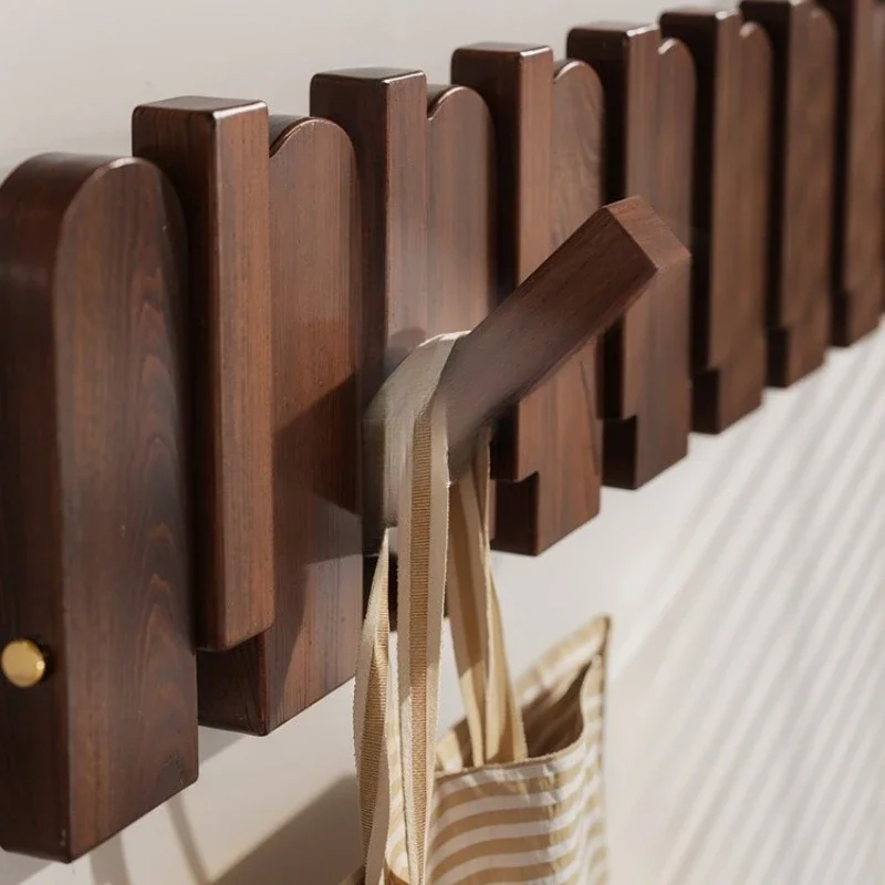Piano keys on the wall hangers hangers at entrance porch behind door living room on wall
Piano keys on the wall hangers hangers at entrance porch behind door living room on wall