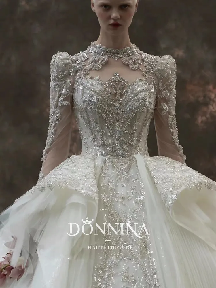 Luxury Wedding Dresses Lace Beaded Crystals Metal Court Train Sequins High Neck Long Sleeve Ruffle Shining Princess Bridal Gown
Luxury Wedding Dresses Lace Beaded Crystals Metal Court Train Sequins High Neck Long Sleeve Ruffle Shining Princess Bridal Gown