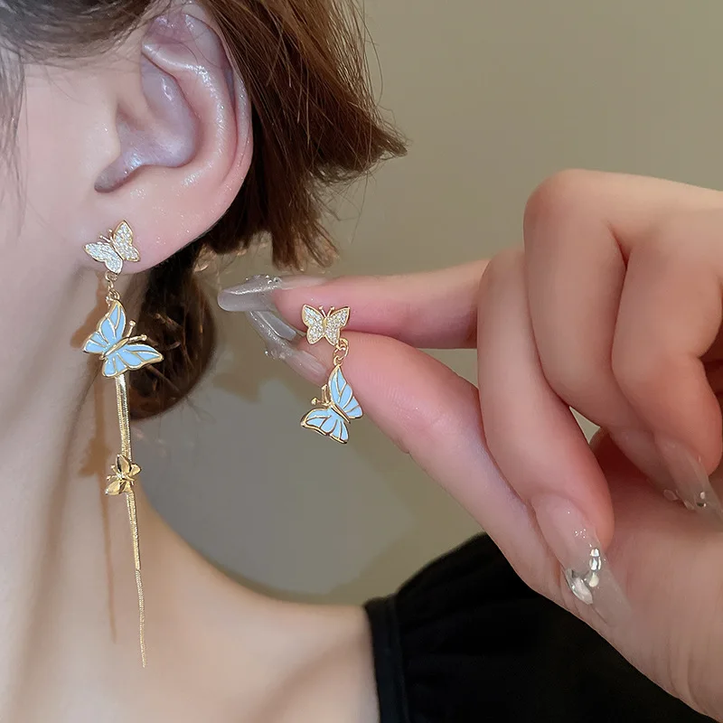 Real Gold Electroplated Silver Needle High-end Zircon Dripping Oil Butterfly Earrings Super Glitter Sweet Asymmetric Tassel
Real Gold Electroplated Silver Needle High-end Zircon Dripping Oil Butterfly Earrings Super Glitter Sweet Asymmetric Tassel