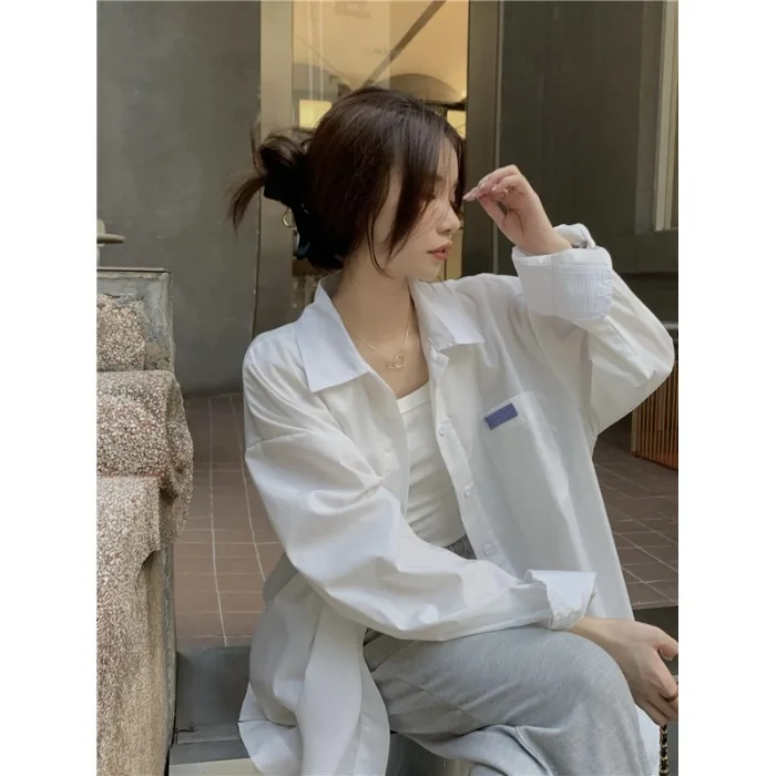 2026 Spring Women's Chic Fashion Design White Long Sleeve Loose Shirt Lazy Style Versatile Simple Match Casual Top
2026 Spring Women's Chic Fashion Design White Long Sleeve Loose Shirt Lazy Style Versatile Simple Match Casual Top