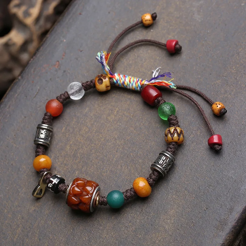 Tibetan-style Many Treasures bracelet with reincarnation bone,devouring barrel beads,hand-woven cord agate and glass accessories
Tibetan-style Many Treasures bracelet with reincarnation bone,devouring barrel beads,hand-woven cord agate and glass accessories