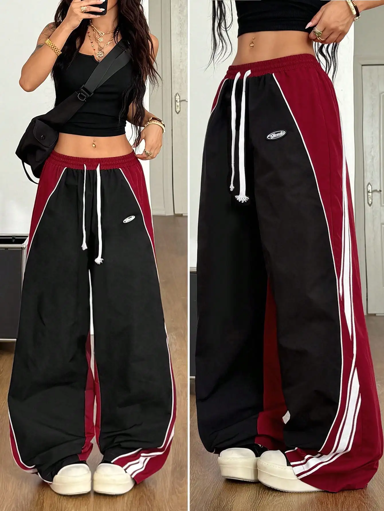 Широкие спортивные брюки унисекс с цветными вставками, завязками на талии и боковыми полосками
Широкие спортивные брюки унисекс с цветными вставками, завязками на талии и боковыми полосками