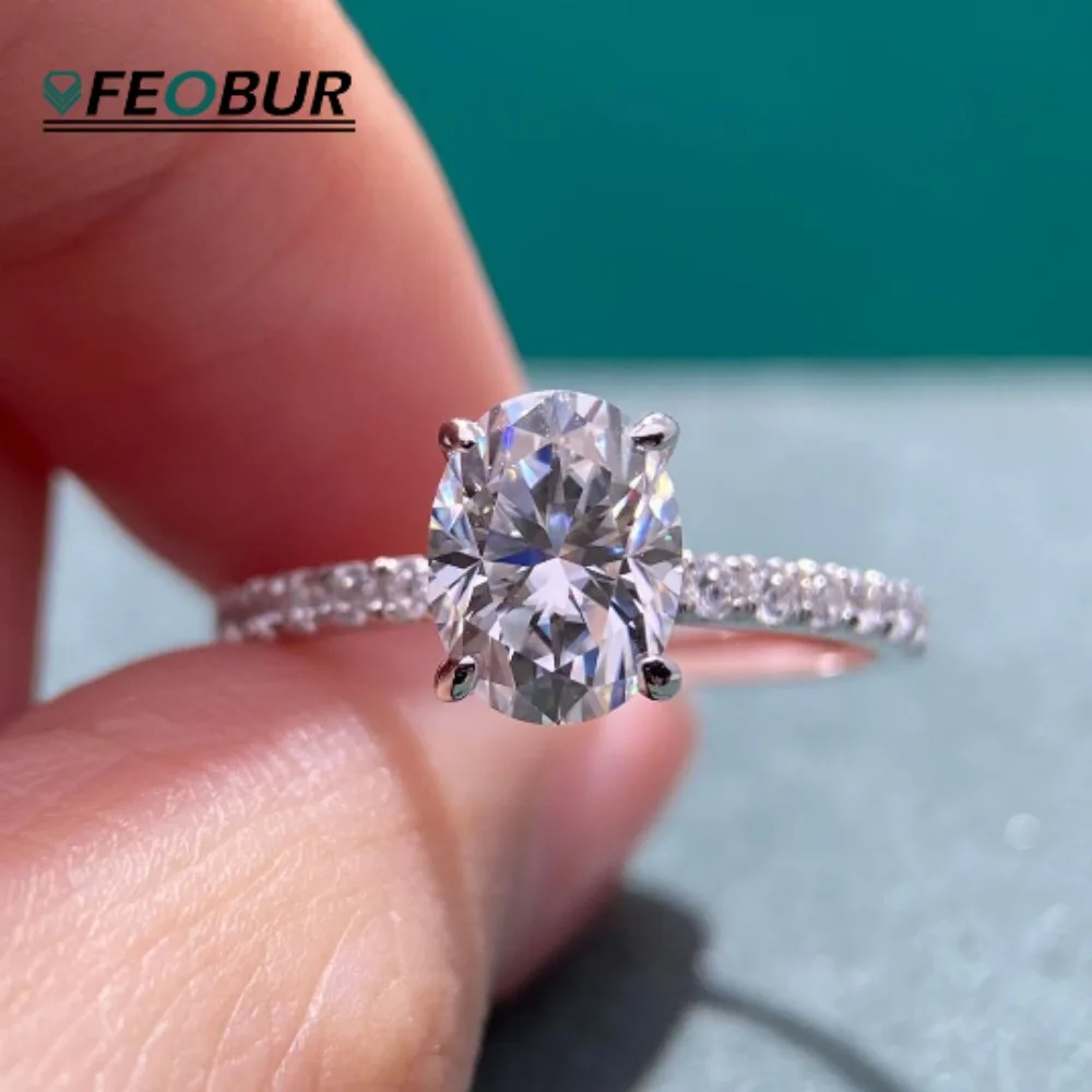 FEOBUR 1/2CT обручальное кольцо с муассанитом овальной огранки для женщин, стерлинговое серебро 925 пробы, свадебное кольцо с бриллиантами, сертифицированные ювелирные изделия
FEOBUR 1/2CT обручальное кольцо с муассанитом овальной огранки для женщин, стерлинговое серебро 925 пробы, свадебное кольцо с бриллиантами, сертифицированные ювелирные изделия