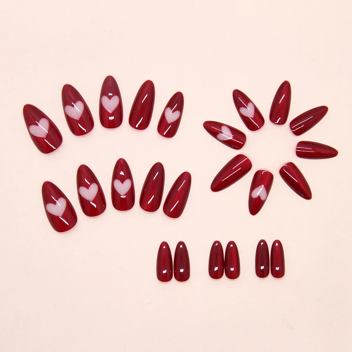 24Pcs Long Almond Press on Nails - Elegant Wine Red Magnetic Cat Eye with White Heart Design False Nails With Wearing Tools 
24Pcs Long Almond Press on Nails - Elegant Wine Red Magnetic Cat Eye with White Heart Design False Nails With Wearing Tools