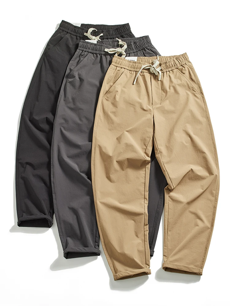 Мужские летние тонкие повседневные брюки с эластичной резинкой на талии, дышащие длинные брюки, модные городские брюки, свободный крой, всесезонные
Мужские летние тонкие повседневные брюки с эластичной резинкой на талии, дышащие длинные брюки, модные городские брюки, свободный крой, всесезонные