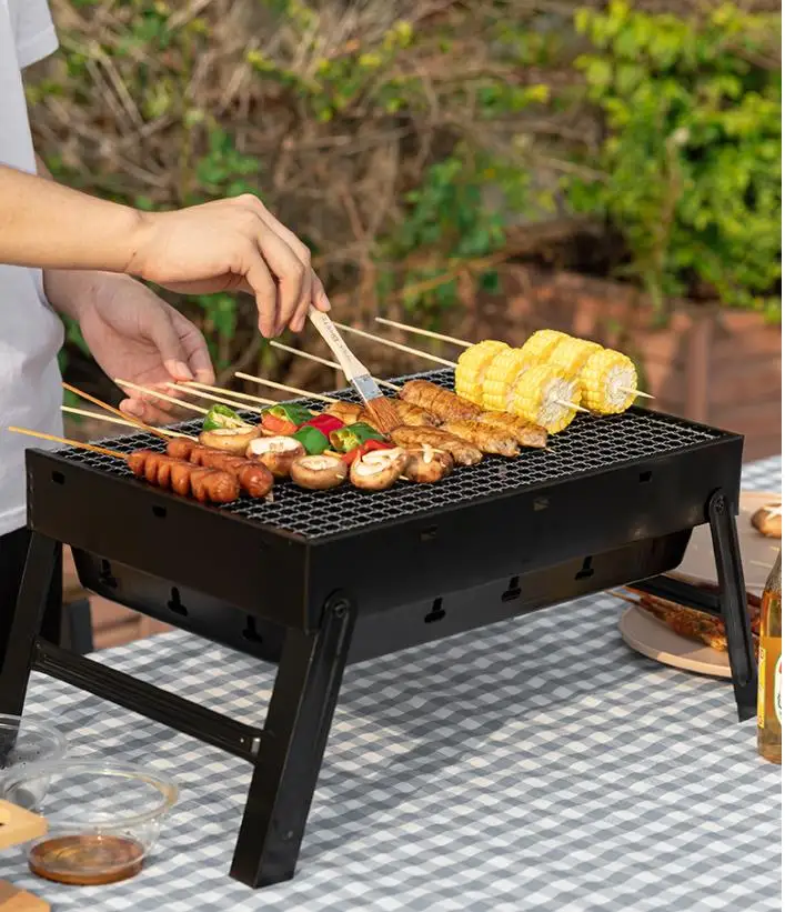 Portable Barbeque Home Charcoal Grill Thickened Folding Barbeque Oven Outdoor Tool Set Furnace
Portable Barbeque Home Charcoal Grill Thickened Folding Barbeque Oven Outdoor Tool Set Furnace