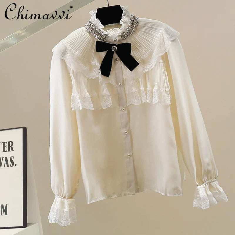 2025 Autumn Clothes New Korean Fashion Heavy Beaded Rhinestone Ruffled Shirt Sweet Loose Elegant Long Sleeve Blouse Women Tops 
2025 Autumn Clothes New Korean Fashion Heavy Beaded Rhinestone Ruffled Shirt Sweet Loose Elegant Long Sleeve Blouse Women Tops
