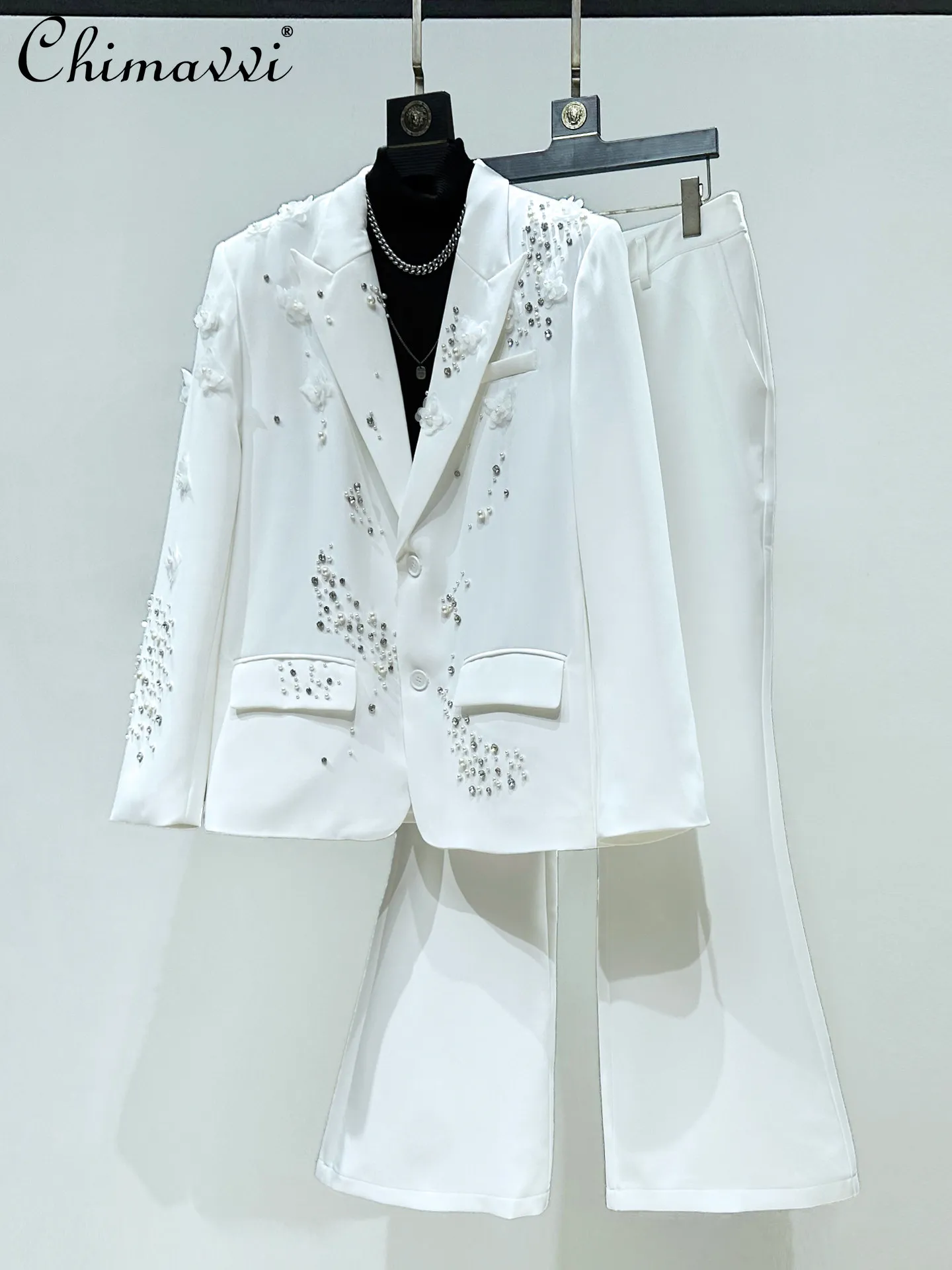 Модный деловой повседневный костюм с бисерной вышивкой и цветочным узором: мужской двубортный пиджак и брюки с высокой талией и расклешенными штанинами, комплект из двух предметов
Модный деловой повседневный костюм с бисерной вышивкой и цветочным узором: мужской двубортный пиджак и брюки с высокой талией и расклешенными штанинами, комплект из двух предметов